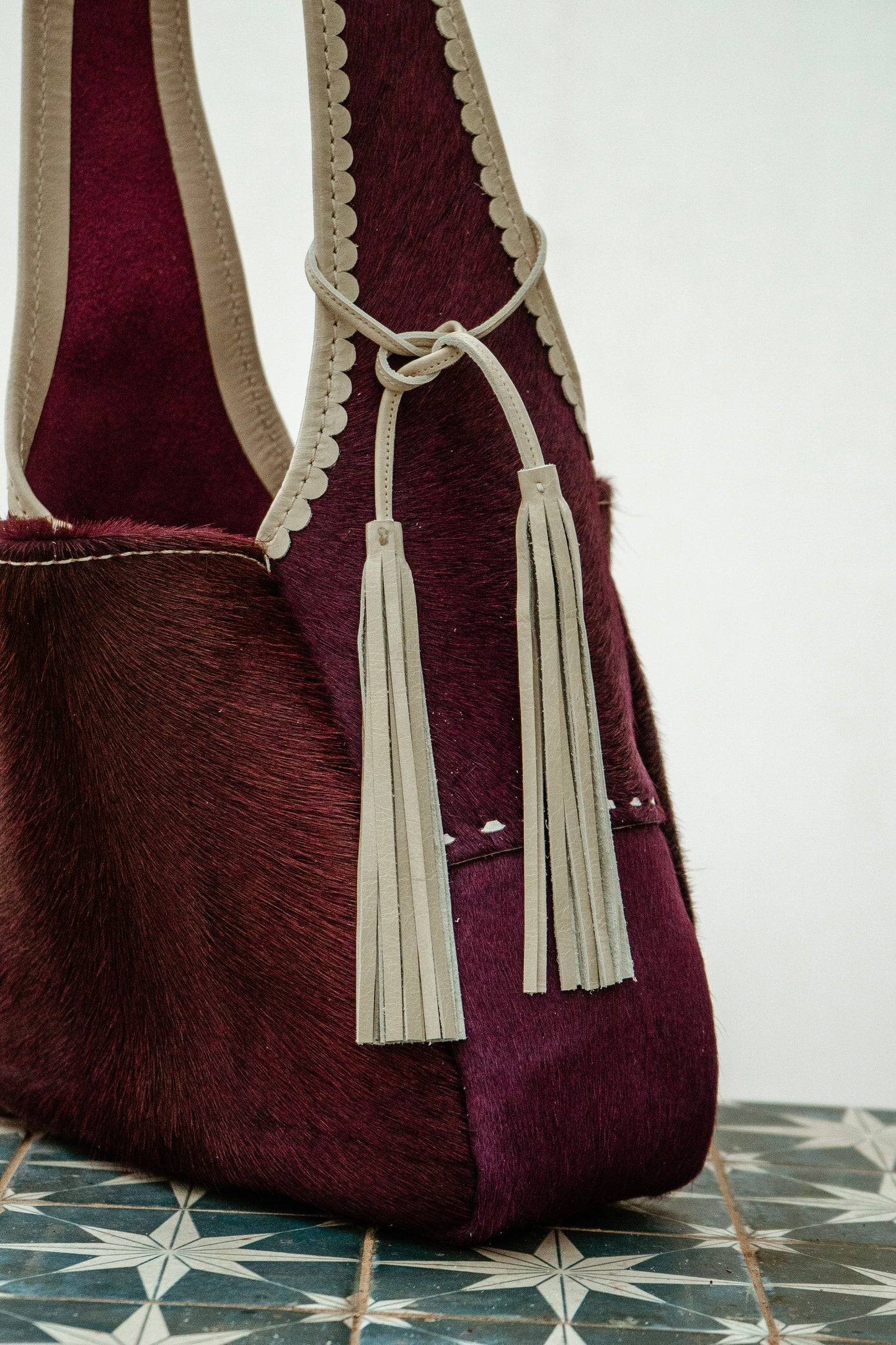 Berry Bright buckstitch hobo bag