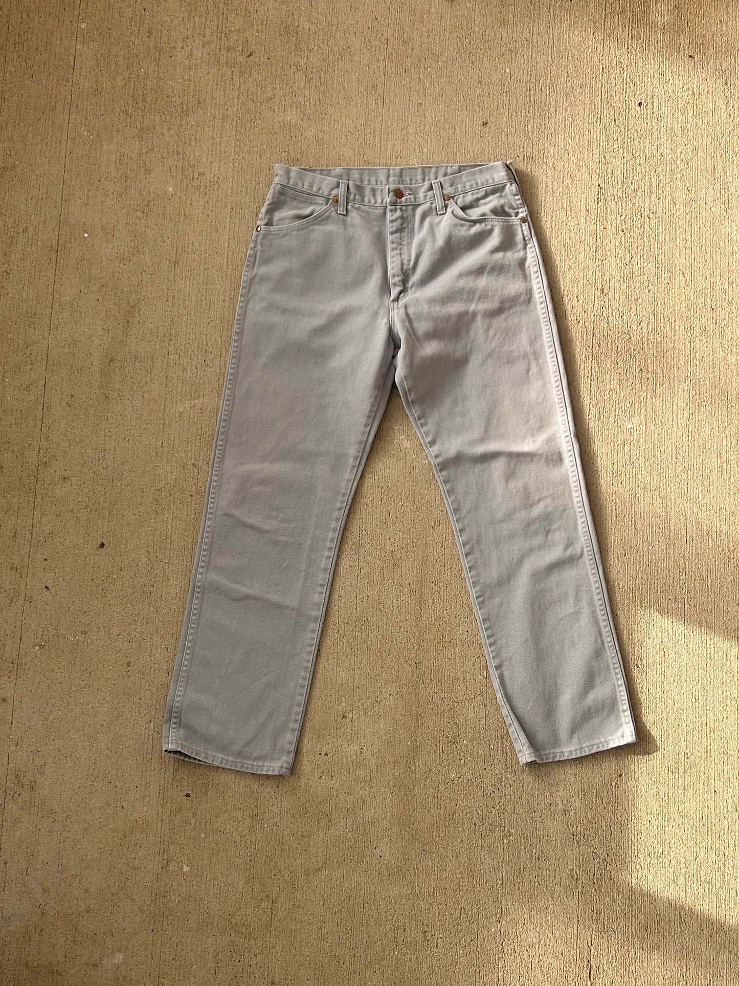 Grey Wrangler jeans
