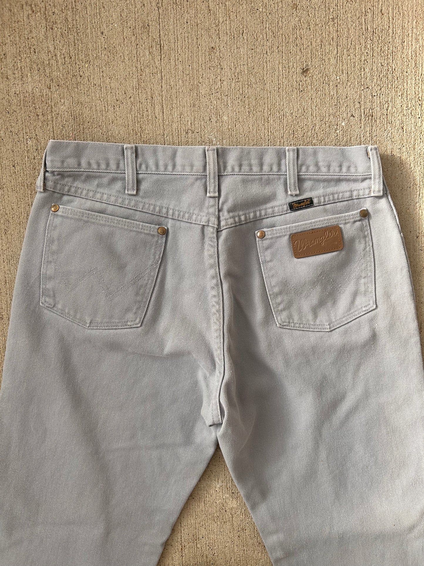 Grey Wrangler jeans